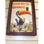 GUINESS TIN & ENAMEL  ADVERTISING SIGN, FEATURING THE TOUCAN SECURING HOLES AT THE CORNERS