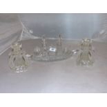 CRYSTAL CUT CONDIMENT SET FITTED IN BOAT SHAPED TRAY &TWO MOULDED GLASS CANDLESTICKS