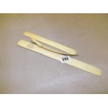 IVORY & BONE PAGE TURNERS & TUSK WITH A PRIMITIVE CARVED TOP