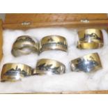 SET OF 6 ORIENTAL SILVER NAPKIN RINGS