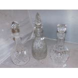 THREE CUT GLASS DECANTERS