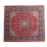 TAPPETO KUM SU FONDO ROSSO Persia A KUM CARPET Persia On red ground 241x245 cm.