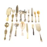 A mixed lot of metal and mother-of-pearl flatware (16) Different manufactures 20th century