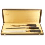 A German set of barbecue cutlery Bone handles and with wooden box 20th century