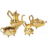 A Queen Victoria vermeil and silver coffee and tea service Repoussé and chasing decorations,