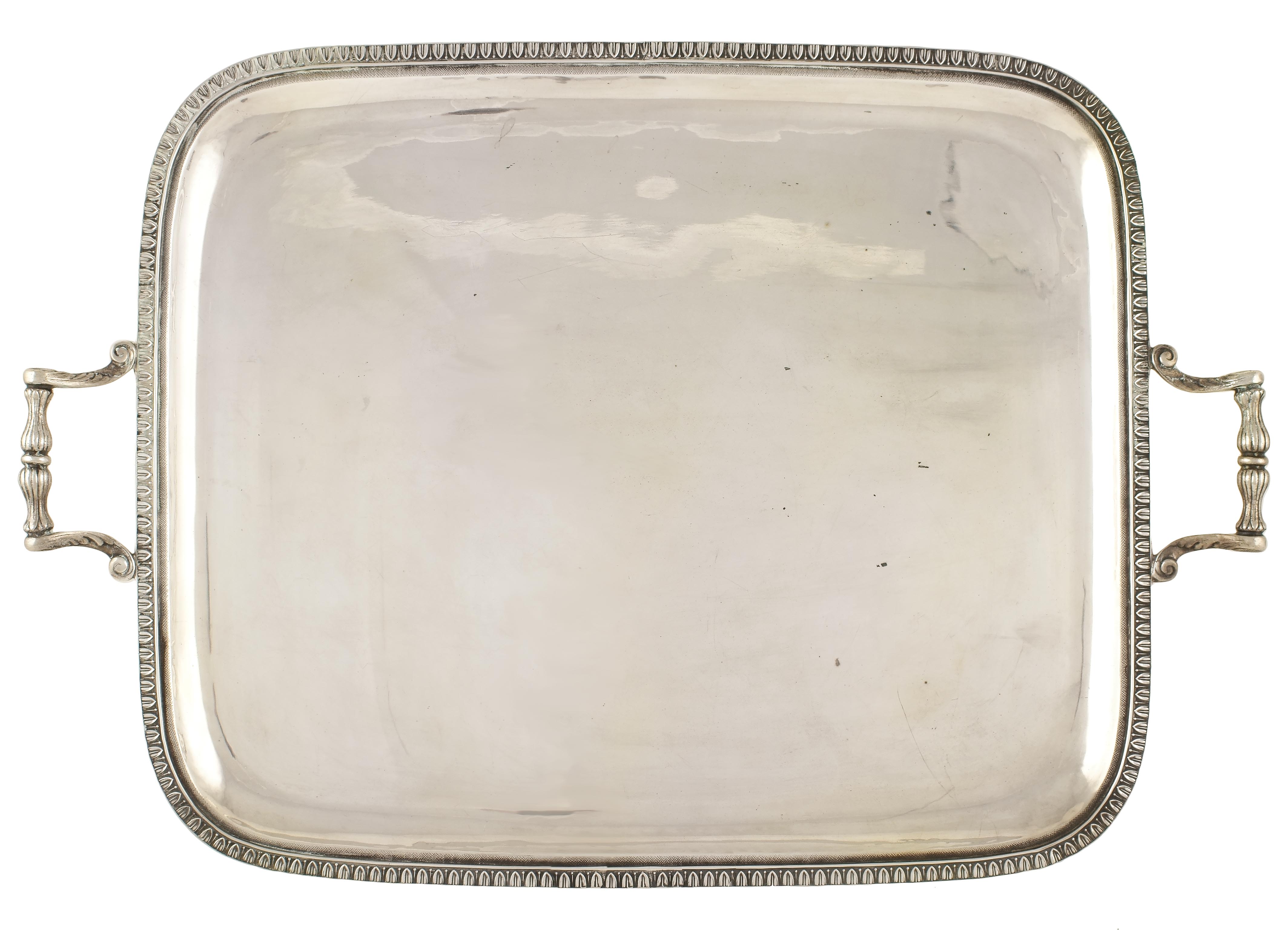 An Italian silver tray Rectangular shaped with two handles 20th century peso 2290 gr.