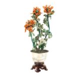 A Chinese silver, coral and semi-precious stone group Modelled as a flower vase, on wooden base 20th