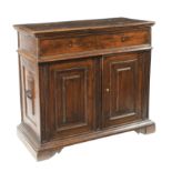 An Italian walnut sideboard The top can be opened, revealing a great compartment. The front doors