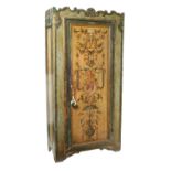 An Italian polychrome-lacquered armoire Decorated with floral ornamentations and scroll-shaped