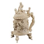 A German ivory tankard allover finely decorated with high reliefs of fauns, putti and female figures