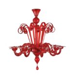 A Murano ruby red ten-branch glass candelabra Elaborated in "Rigadin" with scroll-shaped elements