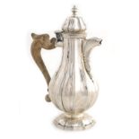 A Venetian silver egoiste coffeepot Scroll-shaped wood handle Venice, 18th century peso lordo 604