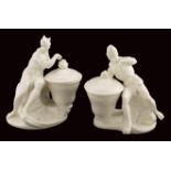 A pair of Nymphenburg porcelain groups Modelled as the personifications of America and Africa,