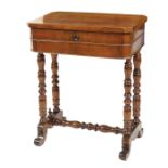 An Italian walnut table The top can be opened and contains different compartments 19th century