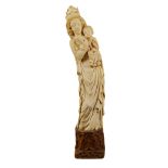 An important French Gothic ivory sculpture the extraordinary statue of the Virgin Mary with Child