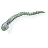 An 18K white gold, blue topaz and tsavorite snake brooch On the head an oval briolet-cut topaz