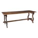 An Italian "fratino" waltnut table Rectangular top, stand connected in the centre with a lyra-shaped