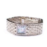 A Cartier lady's 18K white gold and diamond-set wristwatch Bracelet watch with mother of pearl dial,