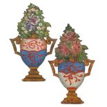A pair of Italian polychromatic-painted wall decorations the two elements are painted on iron and