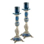 A pair of German silver and lapis lazuli candelabra Silver mountings shaped as bird of preys late