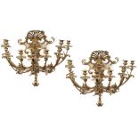 A pair of Louis XV nine-branch wall-lights Foliage and palmette decorations 18th century 64x58 cm.