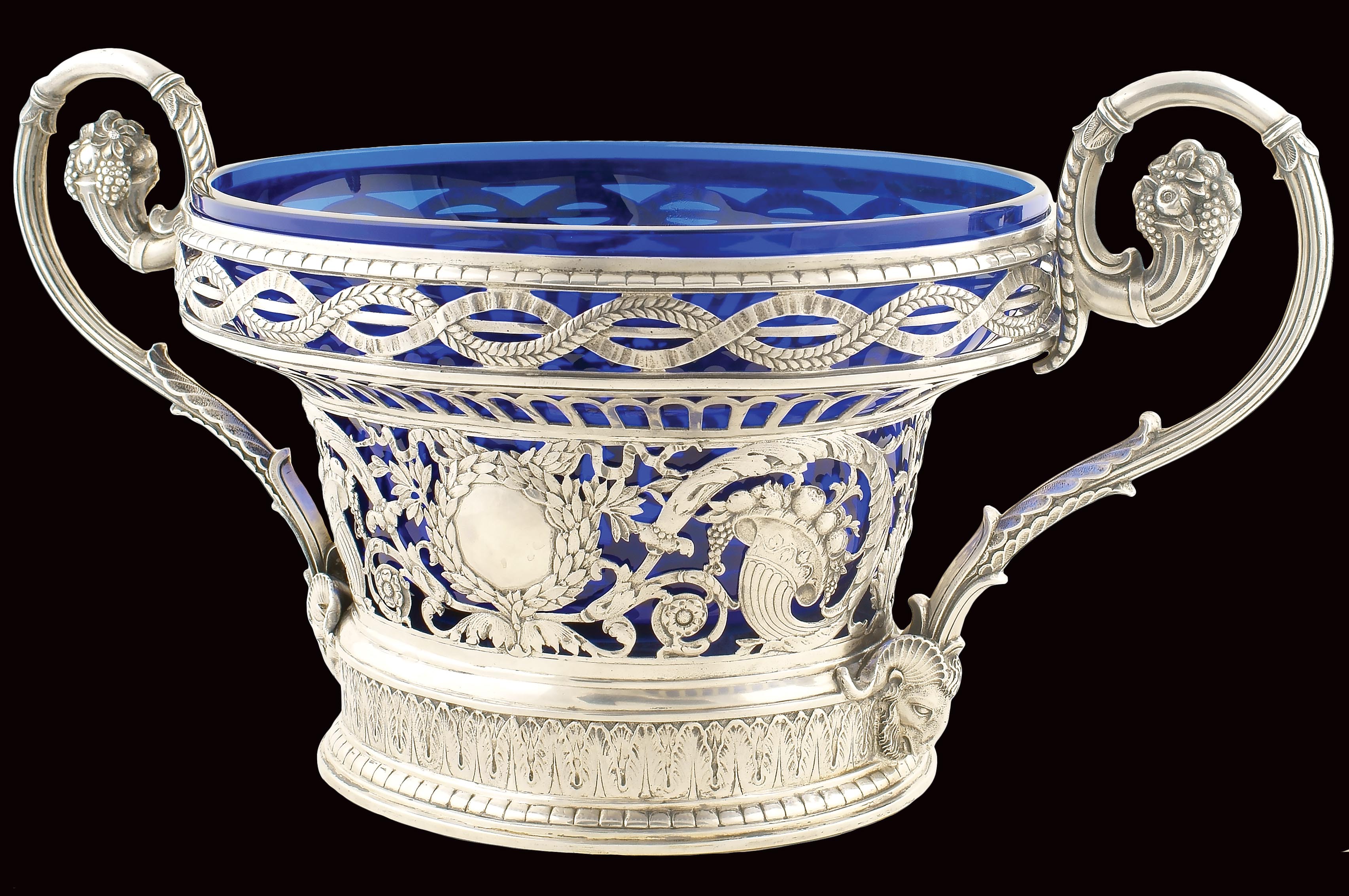 A German silver tray Silversmith Carl Schnauffer, repoussé and chasing decorations, blue glass