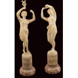 A pair of French ivory sculptures Modelled as two young femmine dancers standing on onyx bases