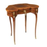 A French marquetry table de toilette Undulated top with a hidden door and ormolu applications 19th