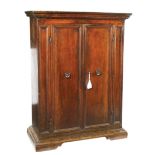 An Italian walnut armoire Two door front with iron handles. Conditions: The structure is in good