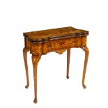 A Dutch walnut and marquetry card table Boxwood marquetry on the top, which can be opened, one