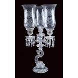 A pair of Baccarat crystal "Dauphin" flambeaux Three branch candelabra with dolphin shaped stand,