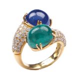 An 18K gold, emerald and sapphire contrariè ring Cabochon-cut emerald and sapphire, weighing approx.