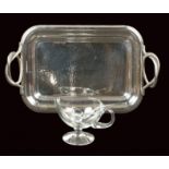 A mixed lot Comprising a rectangular silvered metal tray and a glass sauceboat 20th century