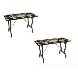 A rare pair of Italian ebonized wood and ivory tables richly decorated all over the top with ivory