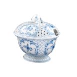 A Meissen porcelain tureen decorated in light blue and blue with floral ornaments, strawberry-shaped