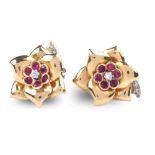 A pair of 18K gold, ruby and diamond earrings Brilliant-cut diamonds weighing approx. 0,15 carats
