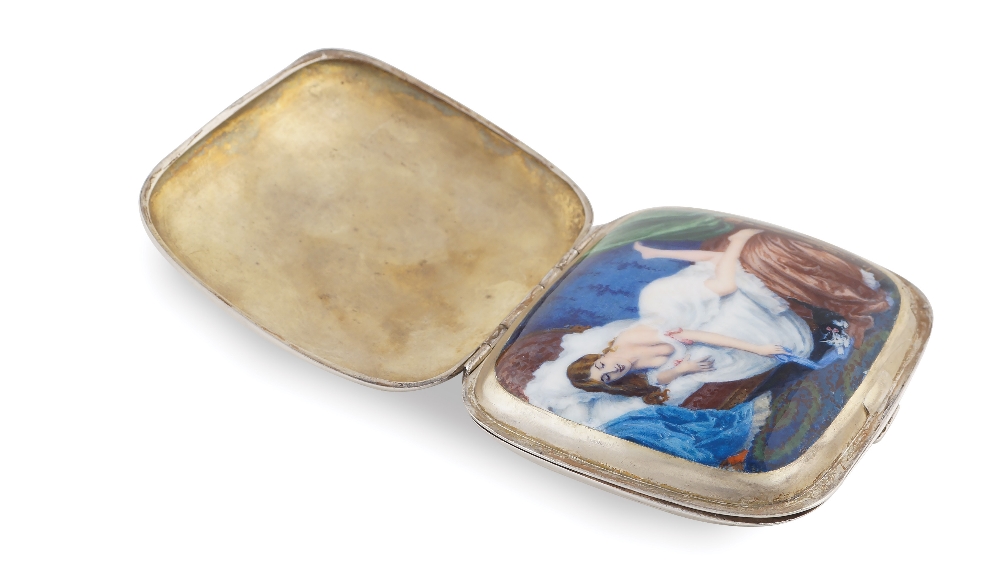 A German silver and enamel box Under the first cover polychromatic decorated with a girl laying on a