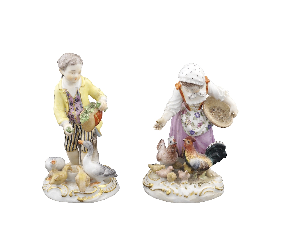 A pair of Meissen porcelain sculptures Polychromatic decorated and partially gilt, modelled as two