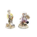 A pair of Meissen porcelain sculptures Polychromatic decorated and partially gilt, modelled as two