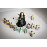 Eleven Dalek Swapits (1965) Cherilea Toys with Louis Marx Dalek (1965) 6½ ins tall lacking battery-