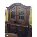 A modern glazed oak dresser.