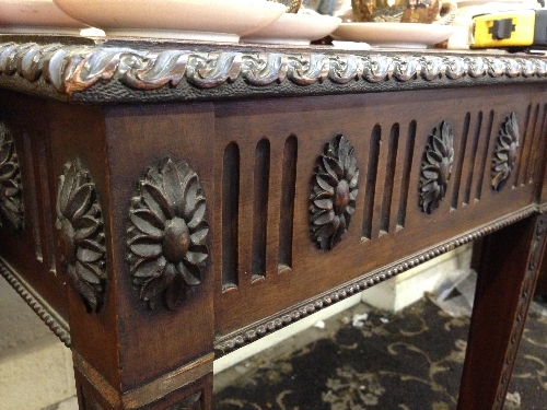 A mahogany side table with centre drawer with ram's head handle, resting on carved sabre supports. - Image 5 of 8