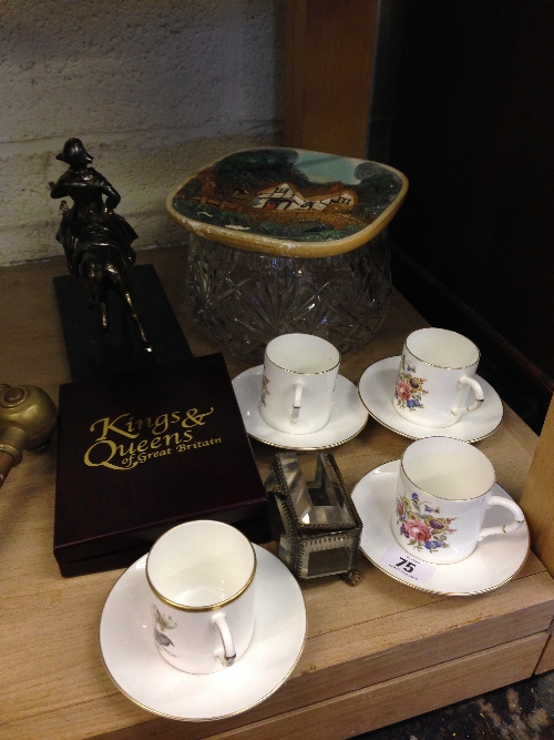 A set of four Royal Worcester bone china coffee cups and saucers decorated in floral patterns