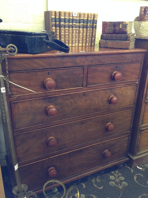 A mahogany chest of two short and three long drawers.