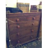 A mahogany chest of two short and three long drawers.