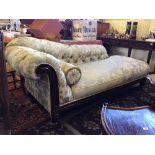 A late 19th century large upholstered chaise longue.