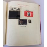 A red stamp album containing a good selection of GB stamps including Queen Victoria Penny Black