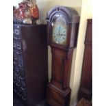 An early 19th century mahogany longcase clock with fusee movement and painted dial,