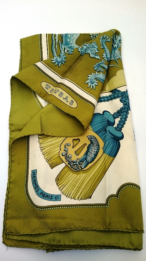 A Hermes Paris silk scarf square, decorated with Dragons,