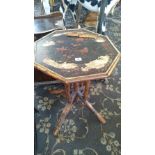 An early 20th century Arts & Crafts bamboo occasional table.